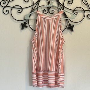 Pink and white striped top with button detailing on the back